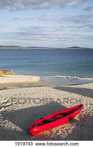 Red Canoe On Beach; Roundstone, County Galway, Ireland View Large Photo Image Stock Image - Red Canoe On Beach; Roundstone, County Galway, Ireland. Fotosearch