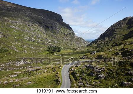 Road Through Mountain Pass; Gap Of Dunloe, County Kerry, Ireland View Large Photo Image Stock Image - Road Through Mountain Pass; Gap Of Dunloe, County Kerry, Ireland. Fotosearch