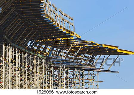 Stock Photograph - scaffolding for partially built overpass on new freeway; malaga, malaga province, andalusia, spain. Fotosearch