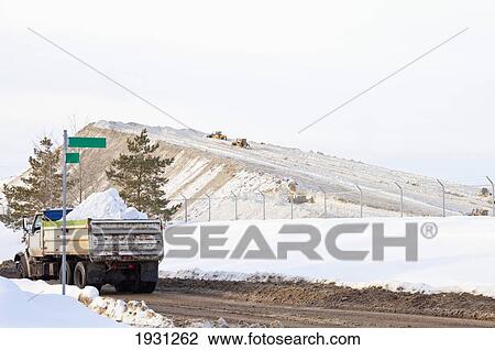 Stock Image - snow storage site; edmonton, alberta, canada. Fotosearch