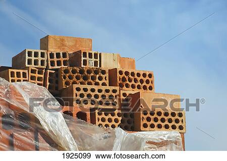 Stock Photo - stack of cavity bricks used in construction; torremolinos, malaga, spain. Fotosearch
