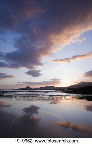 Sunset At Whitestrand Beach Near Castlecove; County Kerry, Ireland View Large Photo Image Stock Image - Sunset At Whitestrand Beach Near Castlecove; County Kerry, Ireland. Fotosearch