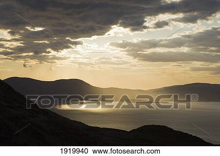 Stock Image - Sunset Over Ballinskelligs Bay Near Waterville; County Kerry, Ireland. Fotosearch