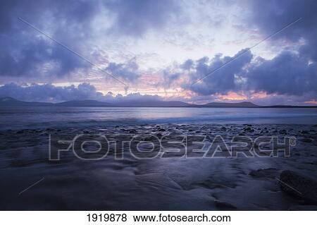 Sunset Over Ballinskelligs Bay; Waterville, County Kerry, Ireland View Large Photo Image Stock Photo - Sunset Over Ballinskelligs Bay; Waterville, County Kerry, Ireland. Fotosearch