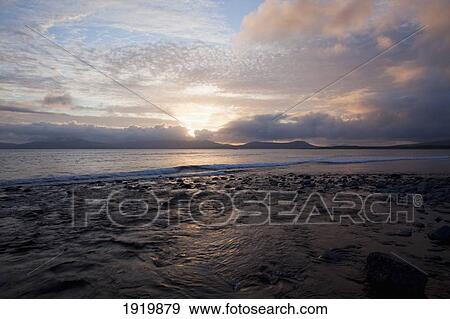 Sunset Over Ballinskelligs Bay; Waterville, County Kerry, Ireland View Large Photo Image Stock Photo - Sunset Over Ballinskelligs Bay; Waterville, County Kerry, Ireland. Fotosearch