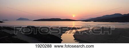 Sunset Over Beach; Derrynane Beach, County Kerry, Ireland View Large Photo Image Stock Photo - Sunset Over Beach; Derrynane Beach, County Kerry, Ireland. Fotosearch