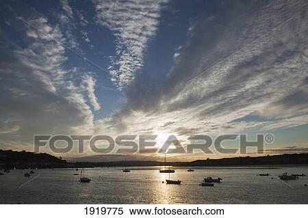 Sunset Over Harbour Boats; Courtmacsherry, County Cork, Ireland View Large Photo Image Stock Photography - Sunset Over Harbour Boats; Courtmacsherry, County Cork, Ireland. Fotosearch