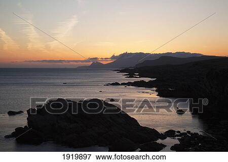 Sunset Over Island; Achill Island, County Mayo, Ireland View Large Photo Image Stock Photo - Sunset Over Island; Achill Island, County Mayo, Ireland. Fotosearch