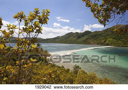 the pure white sands of snake island and bangka boats on the shore, near el nido; bacuit archipelago, palawan, philippines View Large Photo Image Stock Image - the pure white sands of snake island and bangka boats on the shore, near el nido; bacuit archipelago, palawan, philippines. Fotosearch