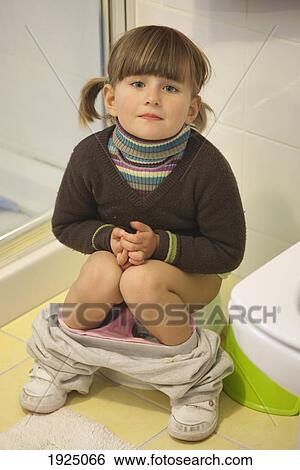 three-year-old girl toilet training; torremolinos, malaga, spain View Large Photo Image Stock Photograph - three-year-old girl toilet training; torremolinos, malaga, spain. Fotosearch