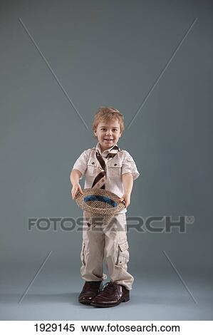 toddler with big shoes and a hat; jordan, ontario, canada View Large Photo Image Stock Photography - toddler with big shoes and a hat; jordan, ontario, canada. Fotosearch