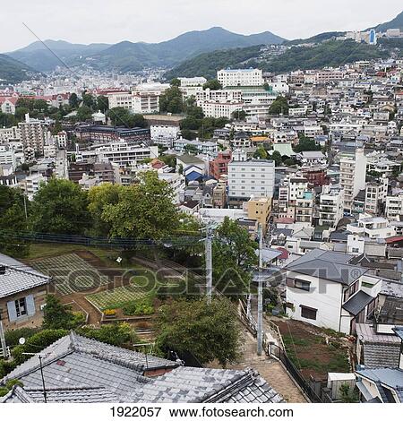 Stock Photo - view of the city and mountains; nagasaki, japan. Fotosearch