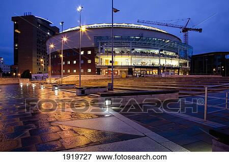 Waterfront Hall Lit Up At Night; Belfast, County Antrim, Northern Ireland View Large Photo Image Stock Photo - Waterfront Hall Lit Up At Night; Belfast, County Antrim, Northern Ireland. Fotosearch