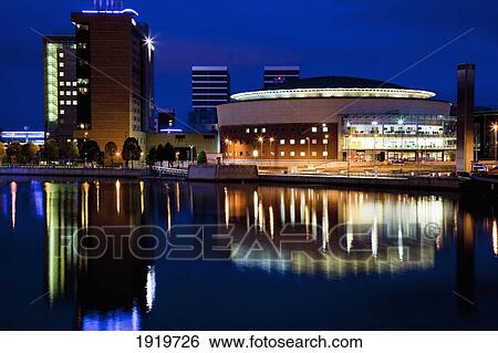 Waterfront Hall Reflected On The River Lagan At Night; Belfast, County Antrim, Northern Ireland View Large Photo Image Stock Photograph - Waterfront Hall Reflected On The River Lagan At Night; Belfast, County Antrim, Northern Ireland. Fotosearch