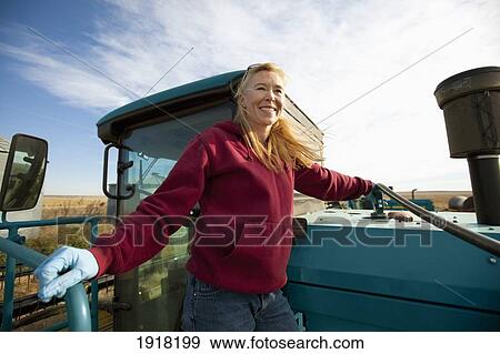 woman gassing up farm machinery; three hills, alberta, canada View Large Photo Image Stock Photo - woman gassing up farm machinery; three hills, alberta, canada. Fotosearch