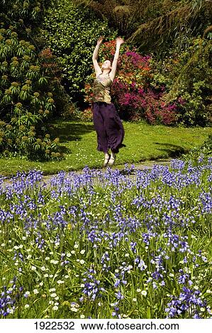 Stock Image - woman in gardens at derrynane house; county kerry, ireland. Fotosearch