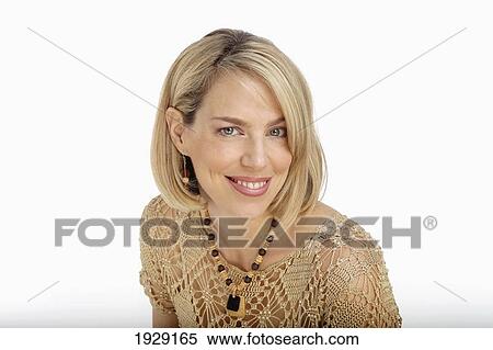 Stock Photography - woman smiling against white background. Fotosearch