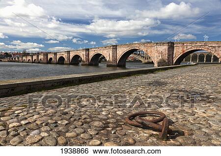 Stock Photograph - A Bridge Going Over River Tweed; Berwick-Upon-Tweed Northumberland England. Fotosearch