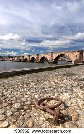 A Bridge Over A River; Berwick-Upon-Tweed Bamburgh England View Large Photo Image Stock Image - A Bridge Over A River; Berwick-Upon-Tweed Bamburgh England. Fotosearch