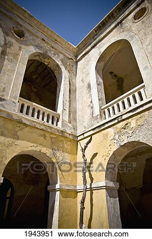 A Building With Archways And Railings On The Second Level; Dakar Senegal View Large Photo Image Stock Image - A Building With Archways And Railings On The Second Level; Dakar Senegal. Fotosearch