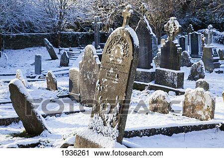 A Cemetery Covered In Snow In Winter; Carrigaline County Cork Ireland View Large Photo Image Stock Image - A Cemetery Covered In Snow In Winter; Carrigaline County Cork Ireland. Fotosearch
