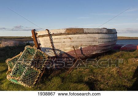 Stock Photo - A Concrete Basin With Lobster Traps; Holy Island Northumberland England. Fotosearch