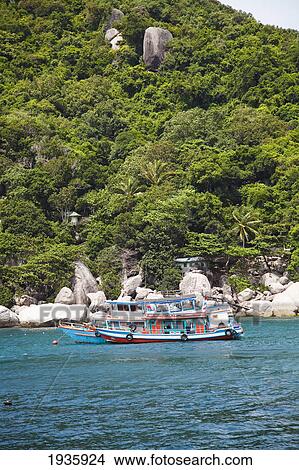 A Dive Boat In The Gulf Of Thailand; Ko Nang Yuan, Thailand View Large Photo Image Picture - A Dive Boat In The Gulf Of Thailand; Ko Nang Yuan, Thailand. Fotosearch
