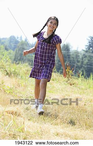 A Girl Wearing A Purple Dress And Braids In Her Hair; Troutdale Oregon United States Of America View Large Photo Image Stock Image - A Girl Wearing A Purple Dress And Braids In Her Hair; Troutdale Oregon United States Of America. Fotosearch