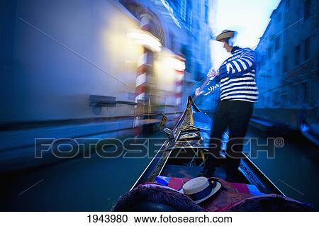A Gondolier Rowing A Gondola; Venice Venezia Italy View Large Photo Image Stock Image - A Gondolier Rowing A Gondola; Venice Venezia Italy. Fotosearch