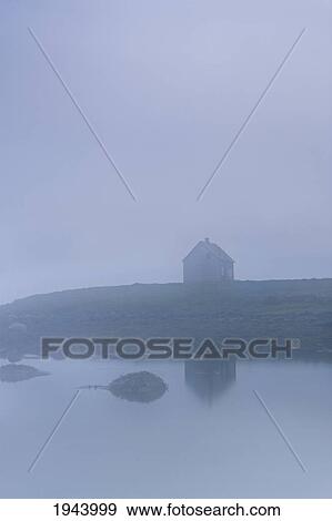 A House Along The Water In The Fog; Iceland View Large Photo Image Stock Photo - A House Along The Water In The Fog; Iceland. Fotosearch