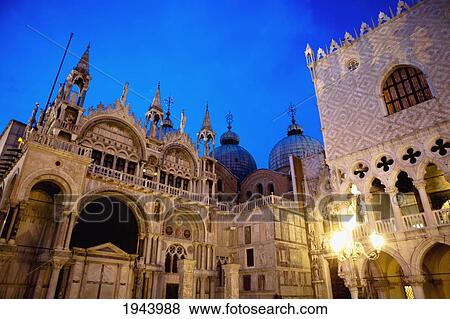 A Light Post Illuminated At Night In Front Of A Building; Venice Venezia Italy View Large Photo Image Stock Photo - A Light Post Illuminated At Night In Front Of A Building; Venice Venezia Italy. Fotosearch