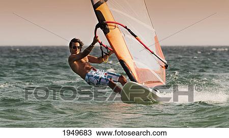 a man windsurfing; tarifa cadiz andalusia spain View Large Photo Image Stock Image - a man windsurfing; tarifa cadiz andalusia spain. Fotosearch