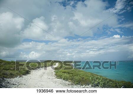 Stock Photograph - A Path Along The Coast; South Caicos Turks And Caicos Islands. Fotosearch