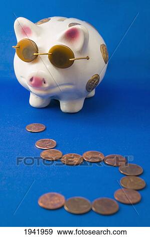 Stock Photo - A Piggy Bank Wearing Sunglasses And A Trail Of Pennies. Fotosearch