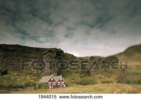 A Red House With A Peaked Roof Beside A Rock Ledge; Iceland View Large Photo Image Stock Photography - A Red House With A Peaked Roof Beside A Rock Ledge; Iceland. Fotosearch