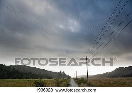 Stock Photo - A Road Through A Rural Area With Power Lines Overhead Near Hobuck Beach; Washington United States Of America. Fotosearch