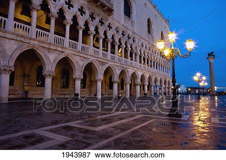 A Street Light Illuminated At Night In Front Of A Building; Venice Venezia Italy View Large Photo Image Stock Photo - A Street Light Illuminated At Night In Front Of A Building; Venice Venezia Italy. Fotosearch