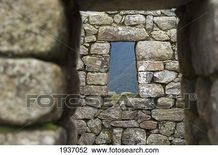 Stock Image - A Window In A Stone Wall In Machu Picchu; Peru. Fotosearch