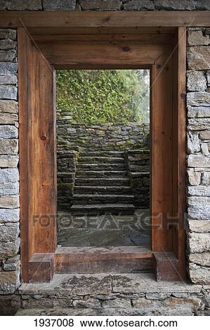 Stock Photo - A Wooden Doorway In Trongsa Museum; Trongsa District Bhutan. Fotosearch