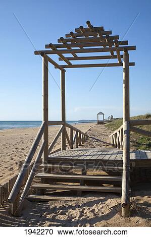 Stock Image - A Wooden Structure At The End Of A Boardwalk At The Beach In Zahora; Andalucia Spain. Fotosearch