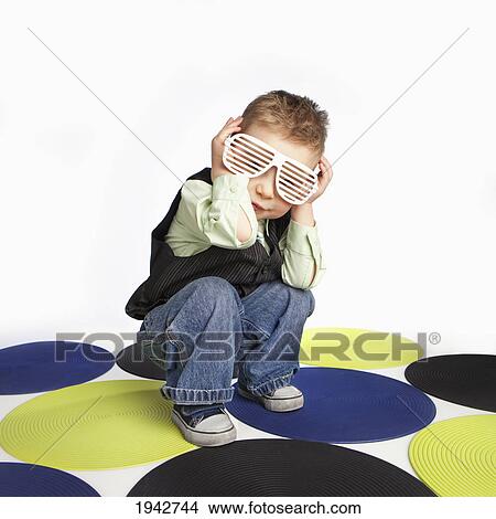 Picture - A Young Boy Wearing Cool Sunglasses; Edmonton Alberta Canada. Fotosearch