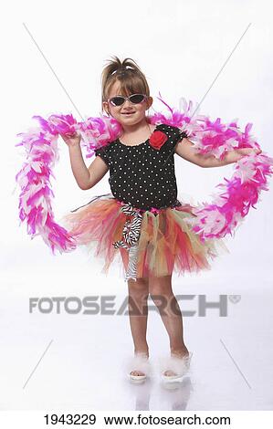 A Young Girl Dancing In Crazy Dress Up Clothes With Sunglasses; Troutdale Oregon United States Of America View Large Photo Image Stock Photo - A Young Girl Dancing In Crazy Dress Up Clothes With Sunglasses; Troutdale Oregon United States Of America. Fotosearch