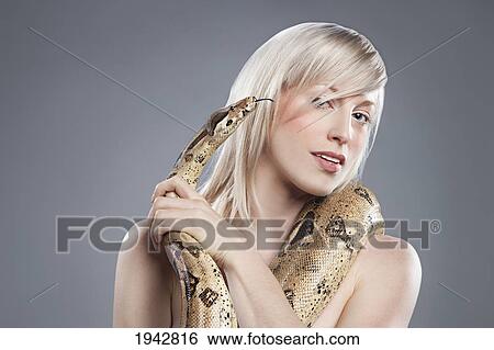 A Young Woman With A Snake Around Her Neck View Large Photo Image Stock Photograph - A Young Woman With A Snake Around Her Neck. Fotosearch