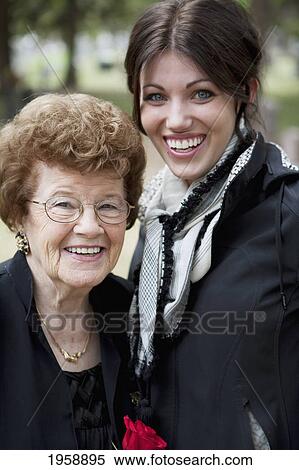Stock Photography - a young woman with her grandmother; edmonton alberta canada. Fotosearch