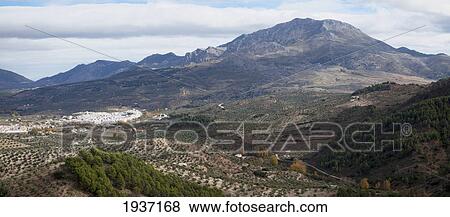Stock Photo - Aerial View Of Village In Sierra De Las Nieves Park; El Burgo Spain. Fotosearch