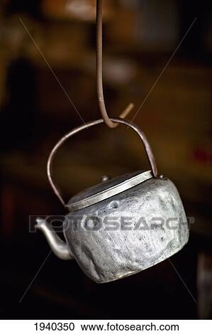 An Old Aluminum Teakettle Hangs On A Steel Hook In Easy Reach; George Town Penang Malaysia View Large Photo Image Stock Image - An Old Aluminum Teakettle Hangs On A Steel Hook In Easy Reach; George Town Penang Malaysia. Fotosearch