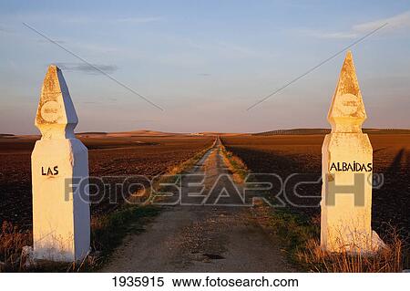 An Old Road Near Camoana With Two Posts On Either Side Saying Las And Albaidas; Andaluaia In Spain View Large Photo Image Stock Photography - An Old Road Near Camoana With Two Posts On Either Side Saying Las And Albaidas; Andaluaia In Spain. Fotosearch