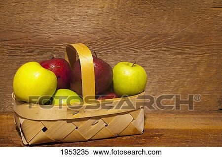 Stock Photography - apples in a basket; waterloo quebec canada. Fotosearch