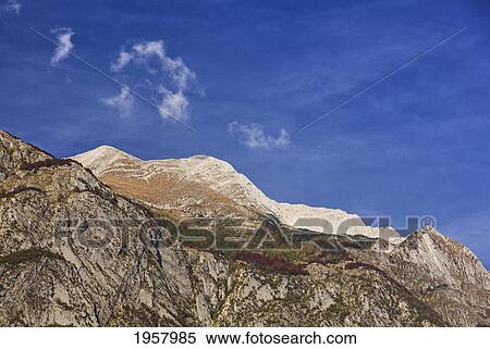 autumn foliage amongst the rocky mountains of the julian alps; soca valley gorenjska slovenia View Large Photo Image Stock Photography - autumn foliage amongst the rocky mountains of the julian alps; soca valley gorenjska slovenia. Fotosearch