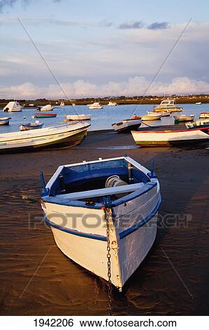 Stock Photograph - Boats Moored Near The Harbor Of Chiclana De La Frontera In Santa Petri; Andalusia Spain. Fotosearch